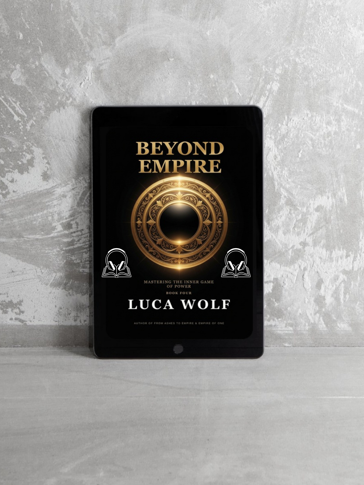 Self-improvement audiobook BEYOND EMPIRE by Luca Wolf on tablet against stone backdrop, mastering the inner game of power