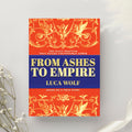 Self improvement journal: From Ashes to Empire by Luca Wolf, promoting unstoppable transformation.